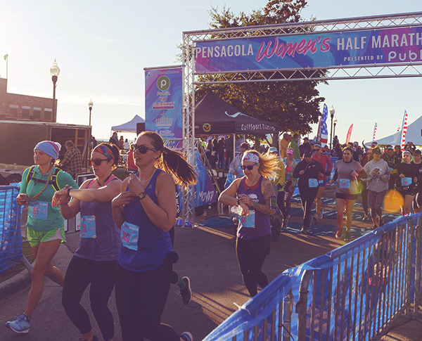 women start the pensacola women's half marathon in downtown Pensacola